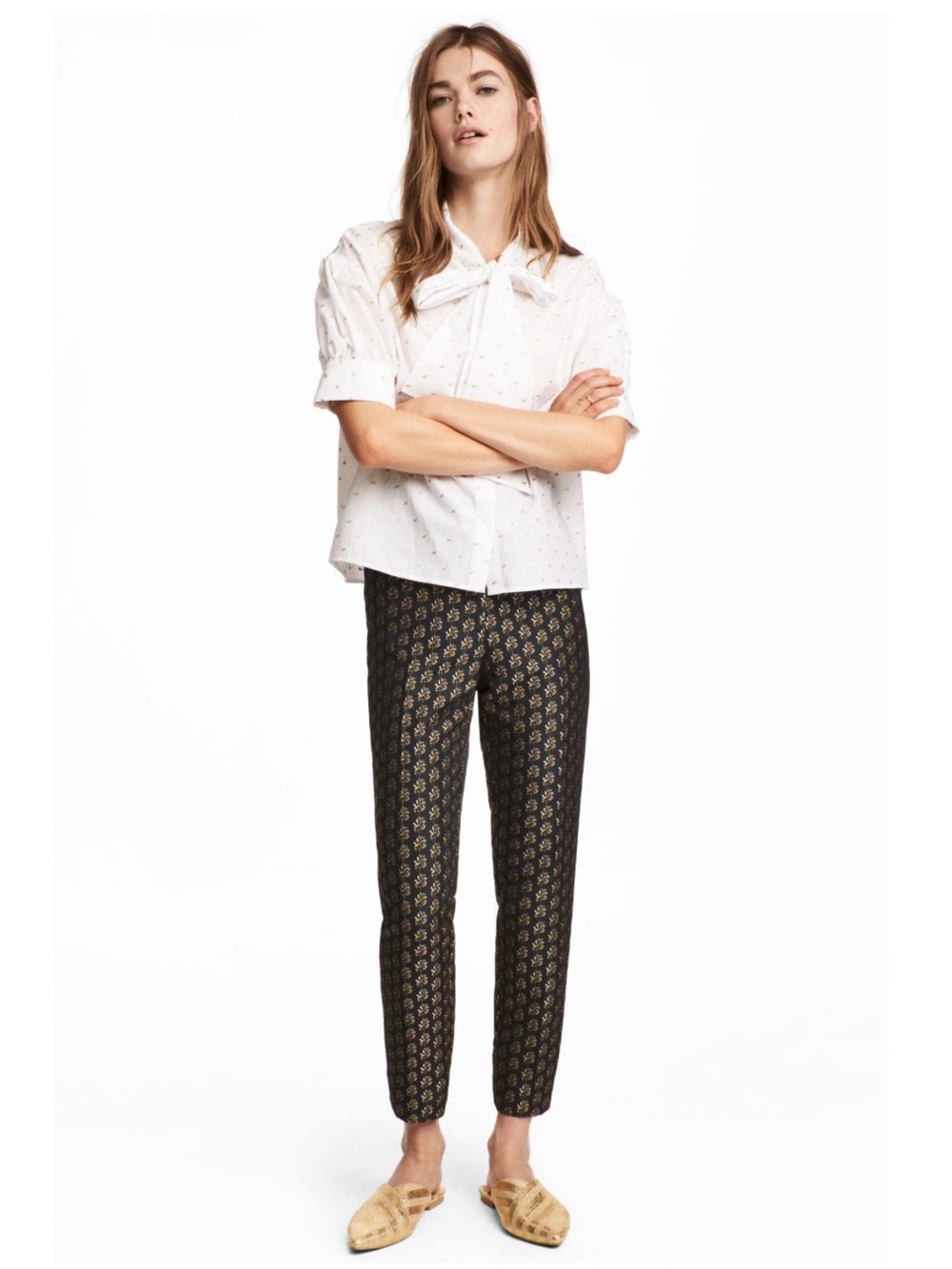 H&M Black Pants with Tan Floral Print Size 10